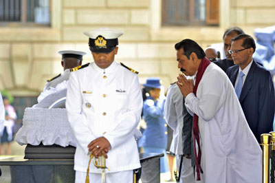 Memorial Service Honoring the Life Of Nelson Mandela held in Colombo President Rajapaksa of Sri Lanka at the lying in state of Nelson Mandela